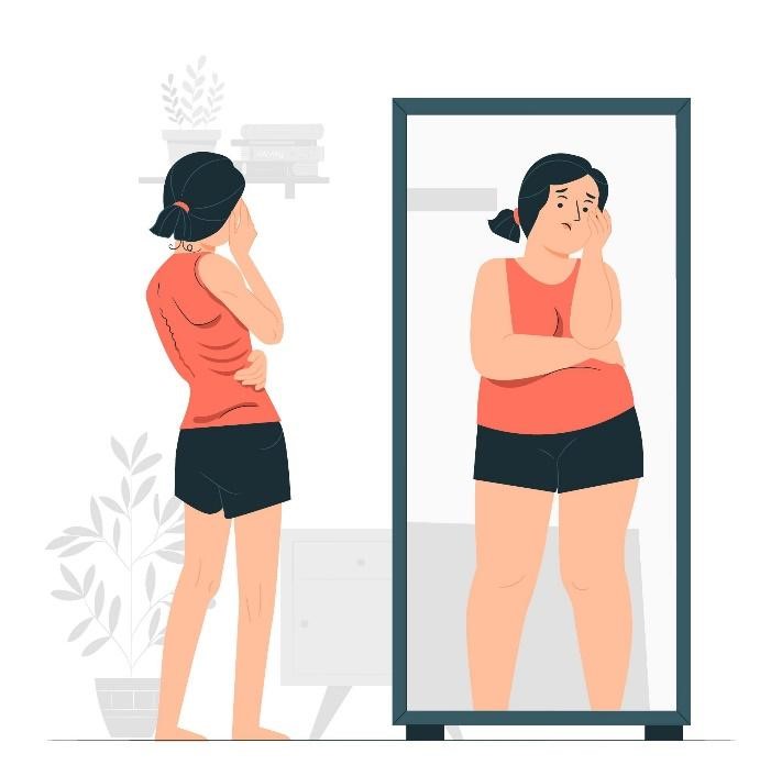 Girl observing mirror Freepik Eating Disorders